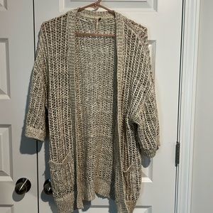 Size M short sleeve long sweater